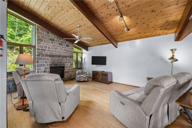 4570 Vine Rd, Jerusalem, NY 14527 - living room featuring ceiling fan, wood finished floors, wooden ceiling, and a fireplace