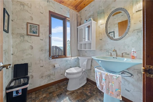 4570 Vine Rd, Jerusalem, NY 14527 - half bathroom with brick patterned floors, wooden ceiling, and wallpapered walls