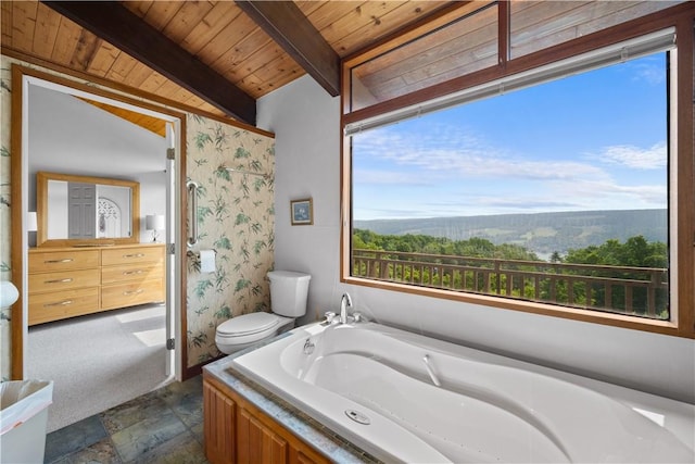 4570 Vine Rd, Jerusalem, NY 14527 - bathroom with a wood ceiling with exposed beams, a jetted tub, stone finish floors, and vanity