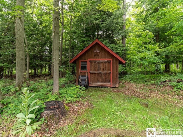 5616 Stow Rd, North Harmony, NY 14710 - view of shed featuring a view of trees