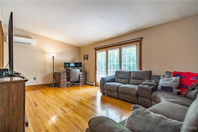 4947 Seneca St, West Seneca, NY 14224 - living area with wood finished floors, vaulted ceiling, a baseboard radiator, an office area, and a wall unit AC