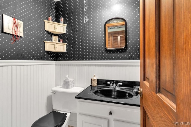 1581 N Forest Rd, Amherst, NY 14221 - half bath with vanity and wallpapered walls