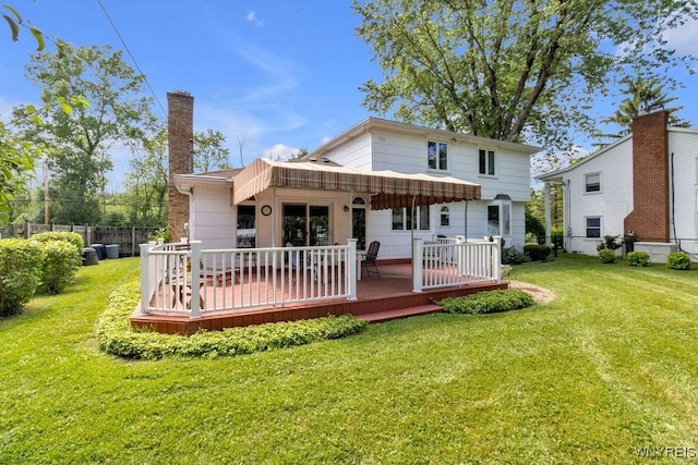 1581 N Forest Rd, Amherst, NY 14221 - rear view of property with a wooden deck and a chimney