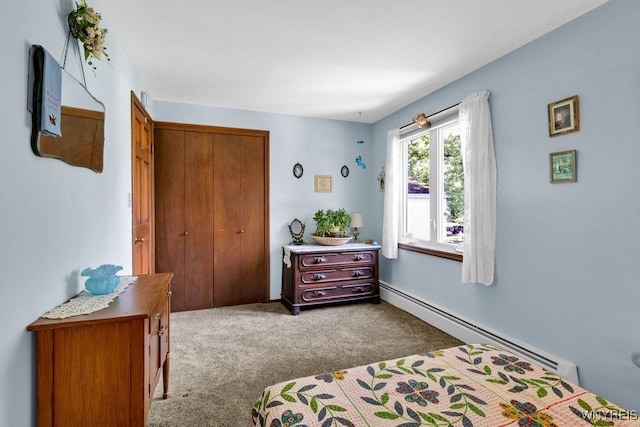 1581 N Forest Rd, Amherst, NY 14221 - carpeted bedroom with a baseboard radiator and a closet