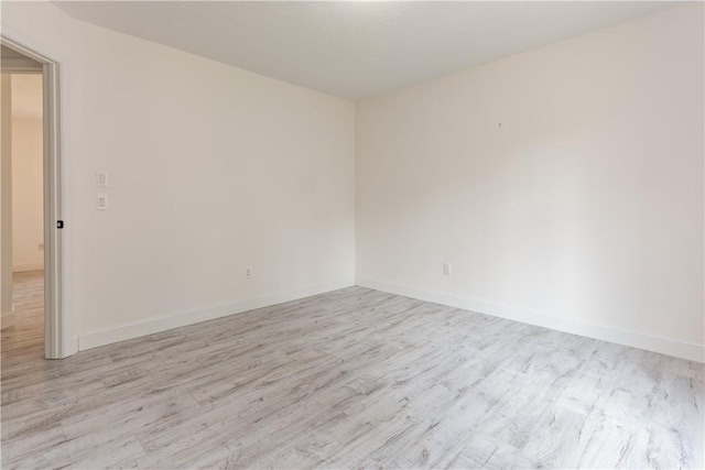 151 Crab Apple Ln, Greece, NY 14626 - unfurnished room with light wood finished floors and baseboards