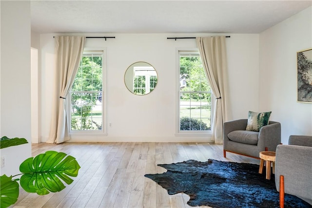 151 Crab Apple Ln, Greece, NY 14626 - sitting room with wood-type flooring and healthy amount of natural light