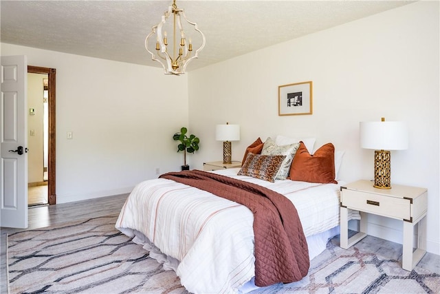 151 Crab Apple Ln, Greece, NY 14626 - bedroom with wood finished floors and a chandelier