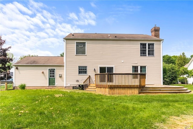 151 Crab Apple Ln, Greece, NY 14626 - rear view of property featuring a chimney, a wooden deck, and a yard