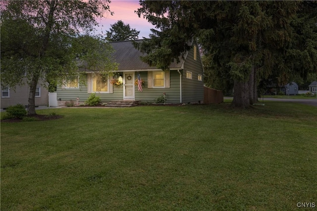 102 Bramley Dr, Camillus, NY 13031 - view of front facade featuring a yard and a shingled roof