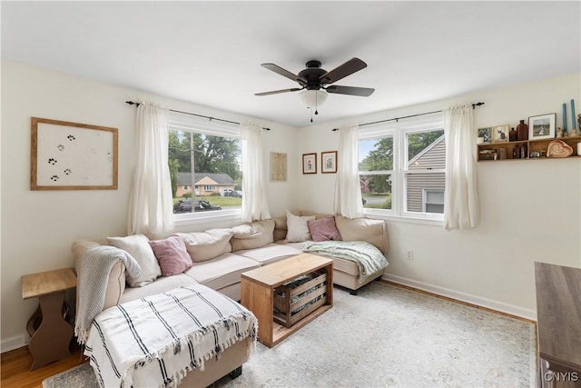 102 Bramley Dr, Camillus, NY 13031 - living area with ceiling fan and wood finished floors