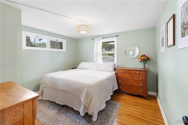 102 Bramley Dr, Camillus, NY 13031 - bedroom with light wood-type flooring and baseboards