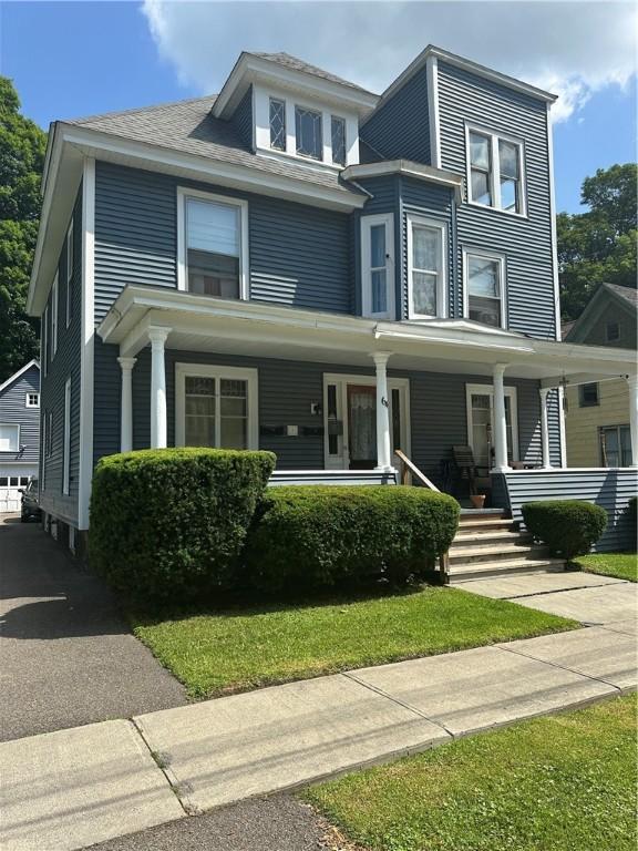 64 Henry St, Norwich, NY 13815 - view of front of home with covered porch