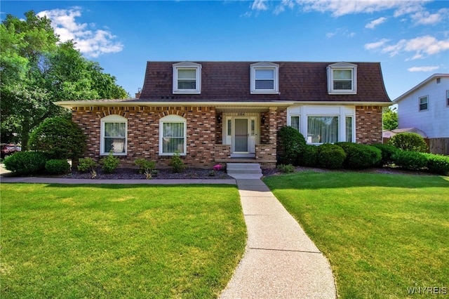 204 Belvoir Rd, Amherst, NY 14221 - view of front facade with brick siding, a shingled roof, a front yard, and mansard roof