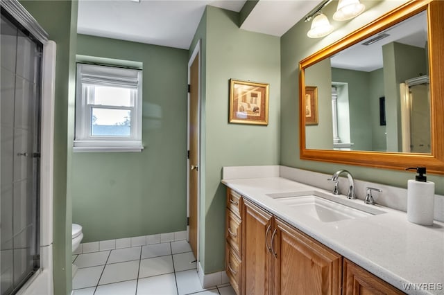 204 Belvoir Rd, Amherst, NY 14221 - full bathroom with vanity, an enclosed shower, and tile patterned flooring