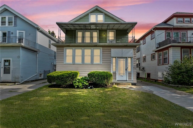 532 Linden Ave, Buffalo, NY 14216 - american foursquare style home featuring a balcony and a yard