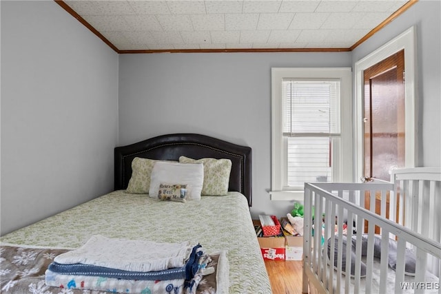 532 Linden Ave, Buffalo, NY 14216 - bedroom with crown molding and wood finished floors