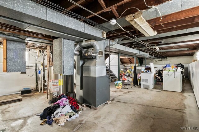 532 Linden Ave, Buffalo, NY 14216 - unfinished below grade area featuring gas water heater, heating unit, separate washer and dryer, and refrigerator