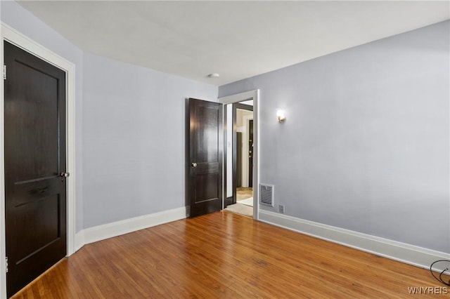532 Linden Ave, Buffalo, NY 14216 - unfurnished bedroom featuring wood finished floors and baseboards