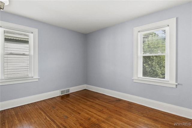 532 Linden Ave, Buffalo, NY 14216 - empty room with baseboards and dark wood-type flooring