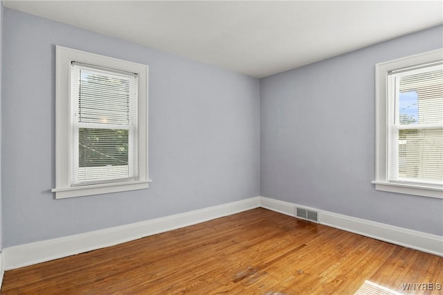 532 Linden Ave, Buffalo, NY 14216 - unfurnished room with healthy amount of natural light and wood finished floors