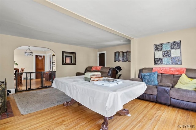 532 Linden Ave, Buffalo, NY 14216 - living room featuring arched walkways and wood finished floors