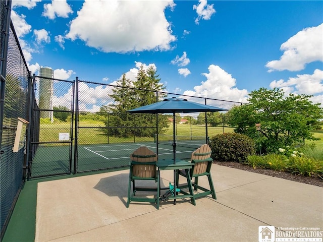 24B Mohawk Dr Unit B, Chautauqua, NY 14728 - view of patio with a gate and a tennis court