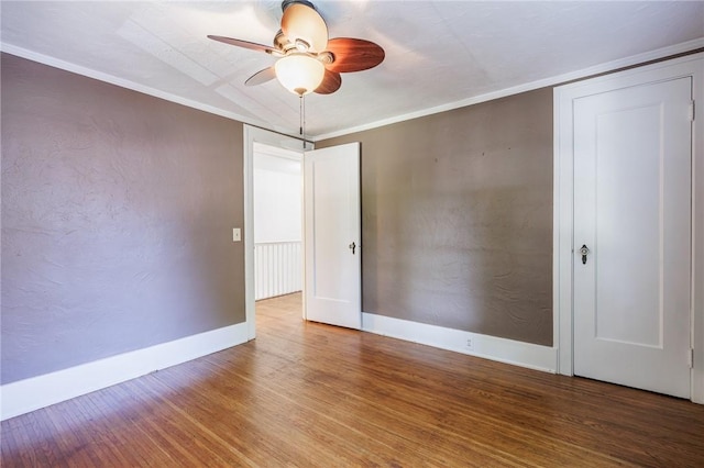 240 Sagamore Dr, Irondequoit, NY 14617 - unfurnished room with wood finished floors, ceiling fan, and crown molding