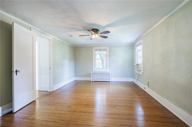 240 Sagamore Dr, Irondequoit, NY 14617 - unfurnished room with radiator heating unit, wood finished floors, crown molding, a ceiling fan, and cooling unit