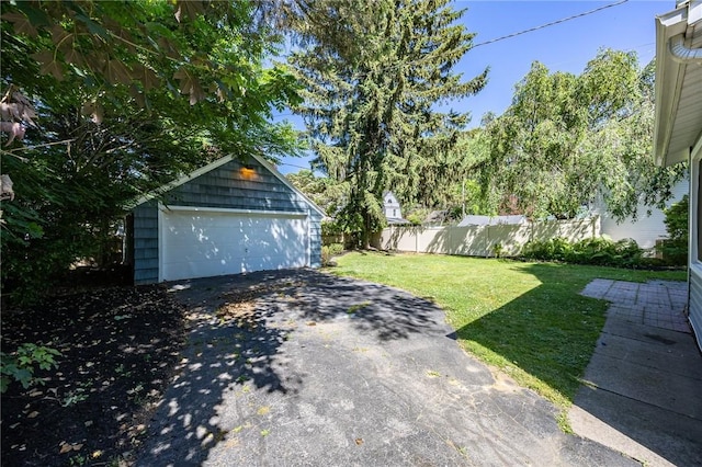 240 Sagamore Dr, Irondequoit, NY 14617 - view of yard featuring an outbuilding and a garage