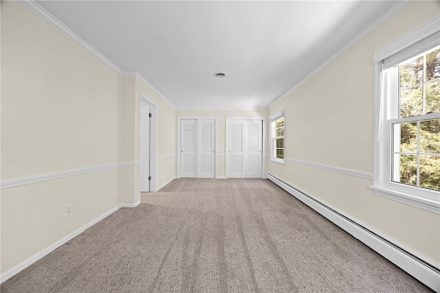 3 Tuxford Rd, Pittsford, NY 14534 - carpeted empty room with baseboard heating, healthy amount of natural light, and crown molding