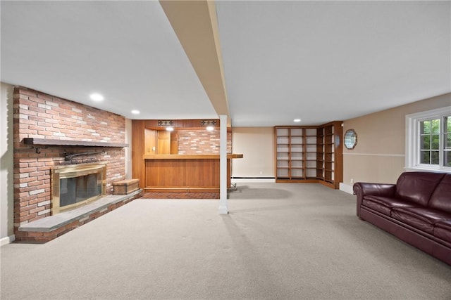 3 Tuxford Rd, Pittsford, NY 14534 - carpeted living area featuring a fireplace, a baseboard radiator, and recessed lighting