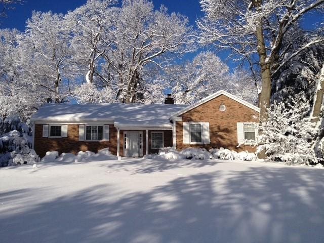 3 Tuxford Rd, Pittsford, NY 14534 - view of front facade featuring a chimney and brick siding