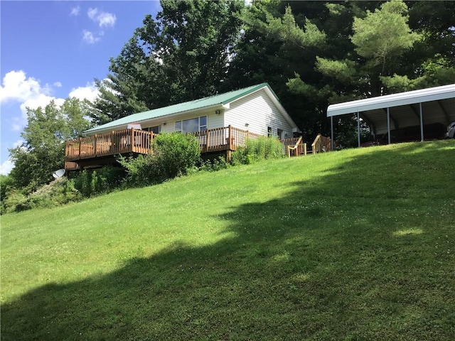 10695 Sandy Hill Rd, Dansville, NY 14437 - view of green lawn featuring a deck