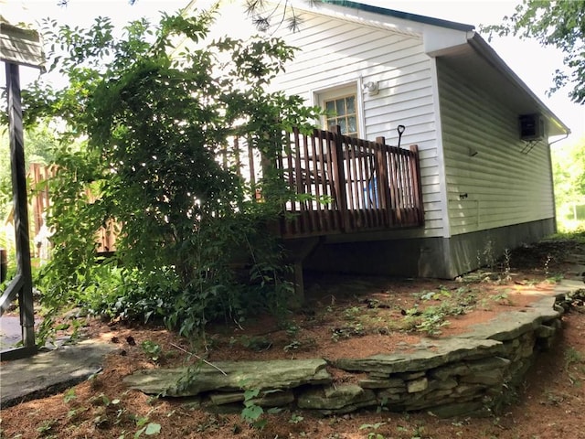 10695 Sandy Hill Rd, Dansville, NY 14437 - view of side of property with a deck