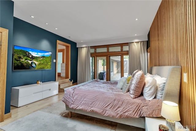 7 Lebrun Cir, Amherst, NY 14226 - bedroom featuring french doors, wood finished floors, access to exterior, and recessed lighting