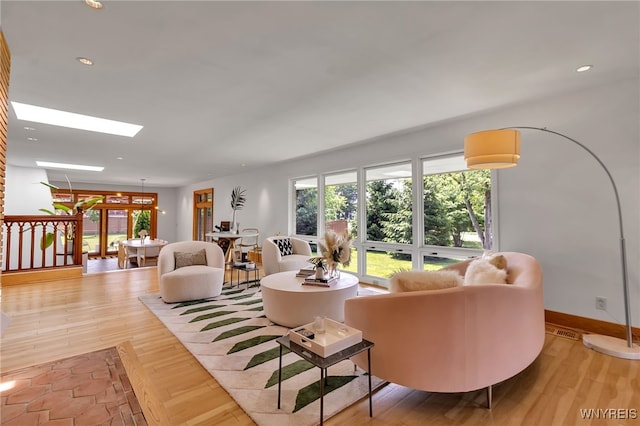 7 Lebrun Cir, Amherst, NY 14226 - living room with light wood-type flooring and recessed lighting