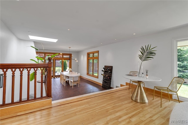 7 Lebrun Cir, Amherst, NY 14226 - dining space featuring a skylight, wood finished floors, and recessed lighting