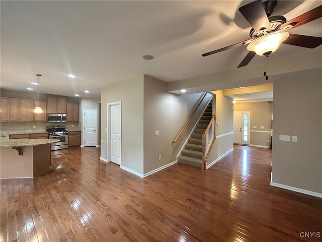 107 Shaker Hts, Camillus, NY 13031 - unfurnished living room featuring dark wood-type flooring, stairway, ceiling fan, and recessed lighting