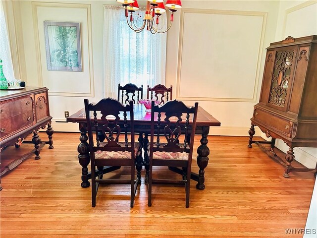 2721 Bowen Rd, Elma, NY 14059 - dining room featuring a chandelier and light wood finished floors
