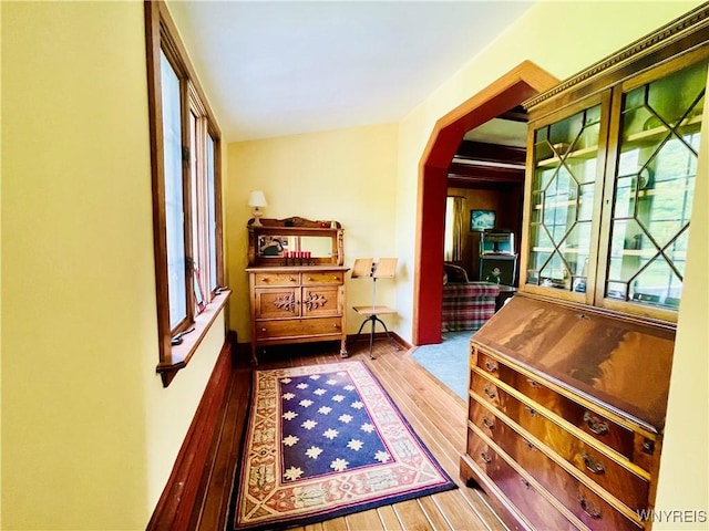 2721 Bowen Rd, Elma, NY 14059 - hall with wood finished floors and arched walkways
