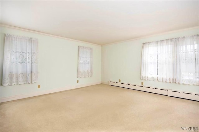 2721 Bowen Rd, Elma, NY 14059 - spare room with ornamental molding, a baseboard radiator, and carpet