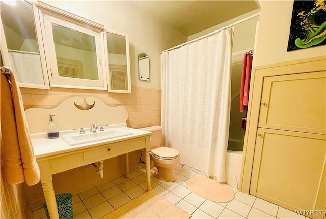 2721 Bowen Rd, Elma, NY 14059 - bathroom featuring tile patterned floors, shower / bathtub combination with curtain, tile walls, wainscoting, and vanity