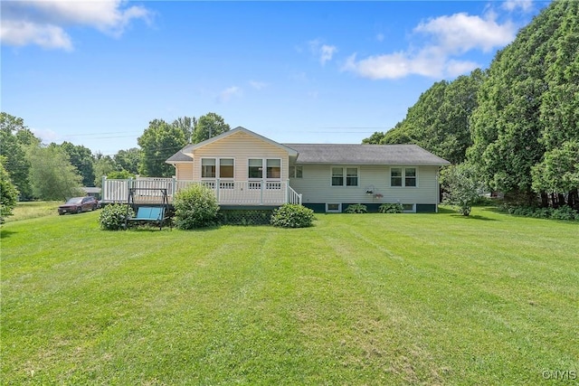206 Oswego River Rd, Schroeppel, NY 13135 - back of house with a yard and a wooden deck