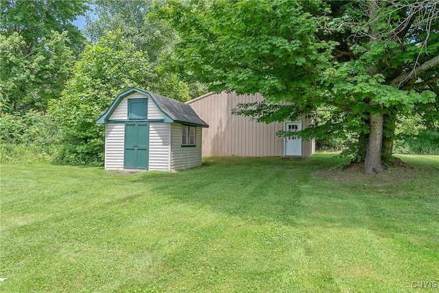 206 Oswego River Rd, Schroeppel, NY 13135 - view of grassy yard with a shed