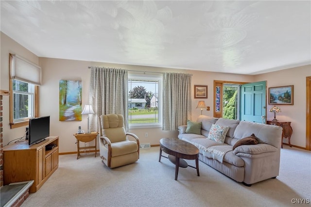 206 Oswego River Rd, Schroeppel, NY 13135 - living room with light colored carpet and plenty of natural light