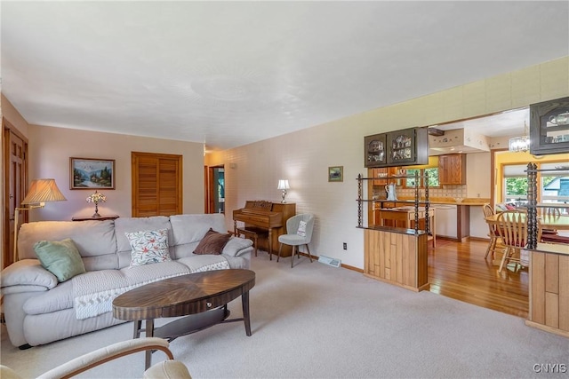 206 Oswego River Rd, Schroeppel, NY 13135 - living room with light colored carpet and baseboards