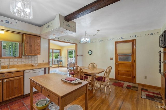 206 Oswego River Rd, Schroeppel, NY 13135 - kitchen featuring dishwasher, a chandelier, backsplash, brown cabinets, and beamed ceiling