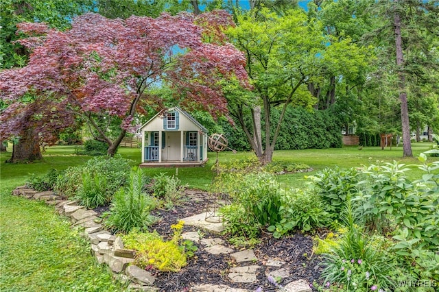 626 Main St, Porter, NY 14174 - view of grassy yard with an outbuilding