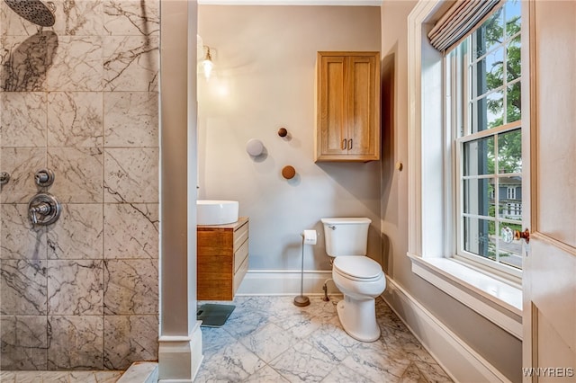 626 Main St, Porter, NY 14174 - full bathroom featuring tiled shower, vanity, and marble finish floors