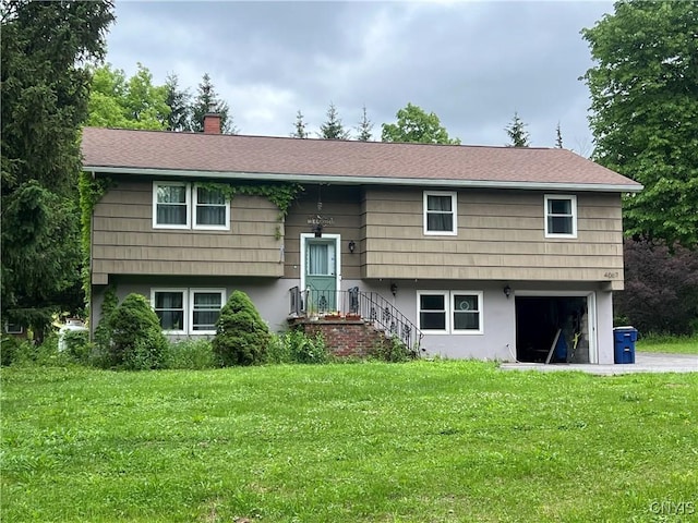 4067 Taylor Rd, Pompey, NY 13078 - raised ranch featuring a garage, a front yard, a chimney, and roof with shingles